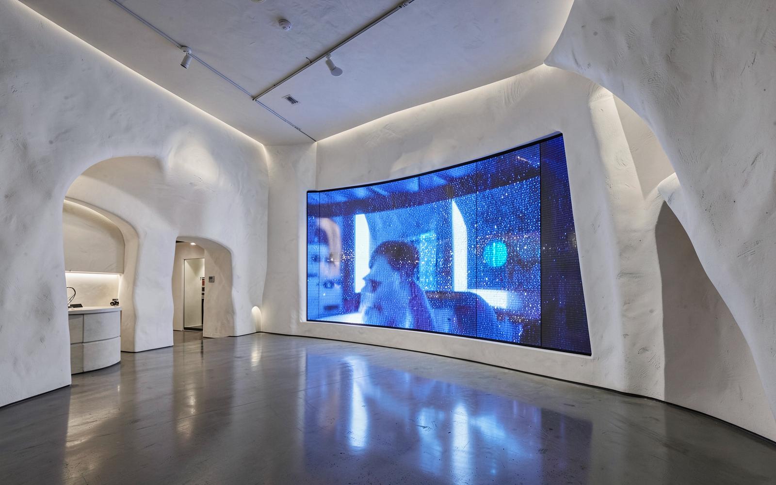 Placeholder flagship retail interior with a large LED wall